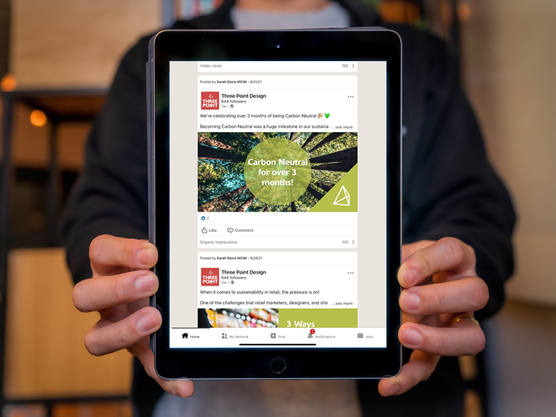 Three Point Design LinkedIn posts shown on a tablet.