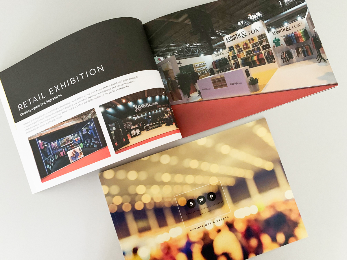 The brochure open on the retail exhibition spread with the cover in front.