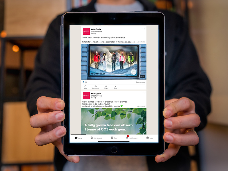 KGK Genix LinkedIn posts viewed on a tablet.